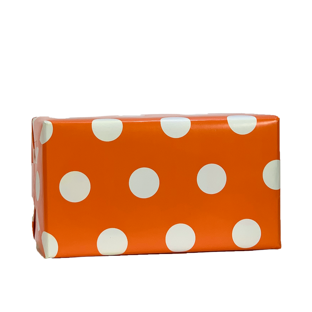 Orange gift wrapping white polka dots